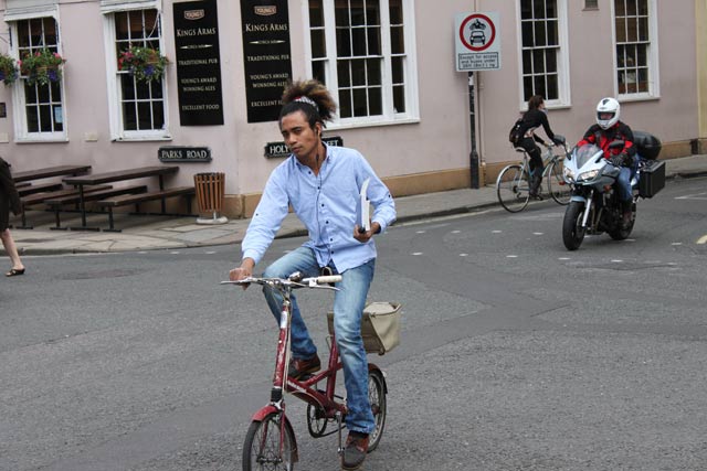 carrying-books-small-bike