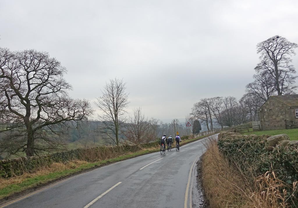 3-riders-in-distance